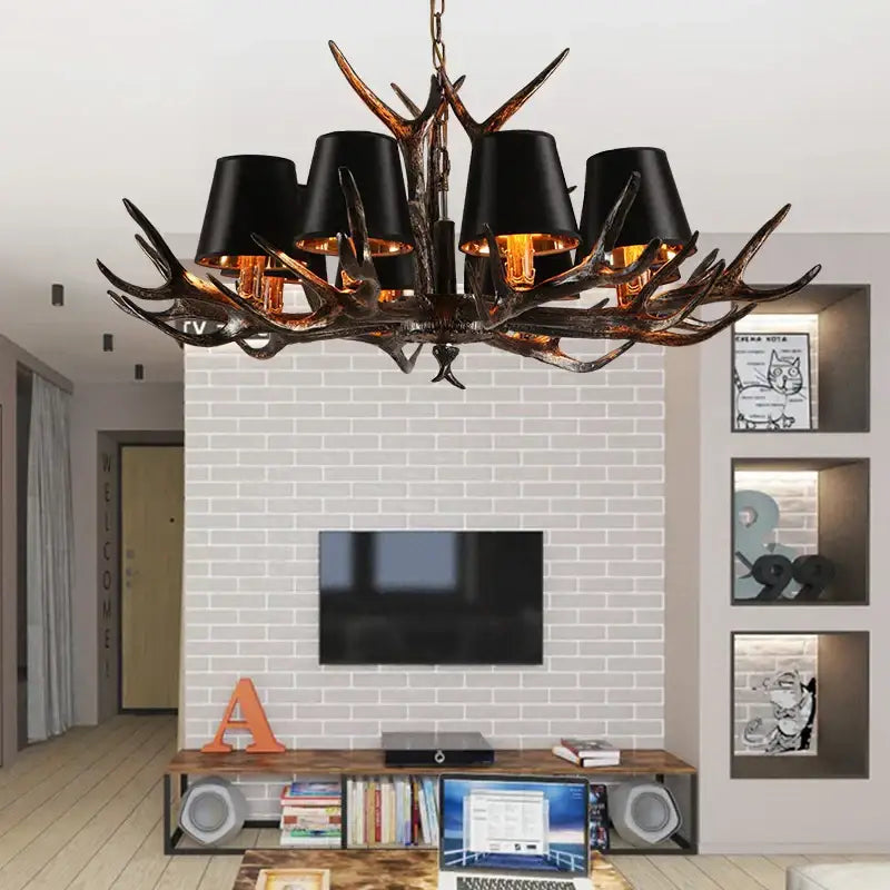 DecorBites antler chandelier with black lampshades and dark rustic resin finish for vintage art deco decor