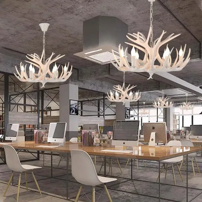 White antler pendant chandelier with multiple candle-style bulbs by decorbites antler pendant for home decor lighting fixtures
