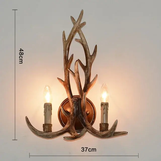 Decorbites antler pendant wall sconce with two candle-style bulbs in rustic bronze metal for industrial home decor lighting