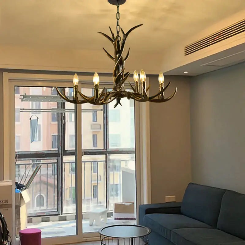 DecorBites antler resin chandelier with bronze finish and six lit bulbs in American country retro style LED hanging lamp