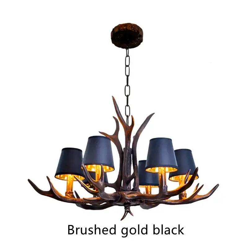 Decorbites antler resin chandelier with brushed gold and black finish and five dark navy lampshades in american country style