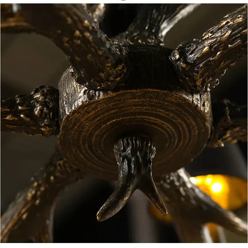 Decorbites antler resin chandelier with dark bronze finish and textured branch-like arms on central wooden disc
