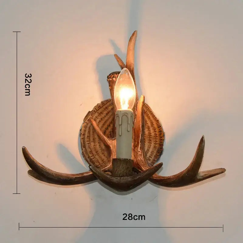 DecorBites antler resin wall lamp with warm rustic finish and candle-style bulb for living room and restaurant decor