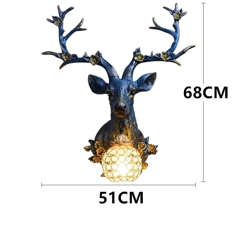 Decorbites antler wall lamp featuring blue resin deer head with gold accents and glowing crystal globe base wall lamp