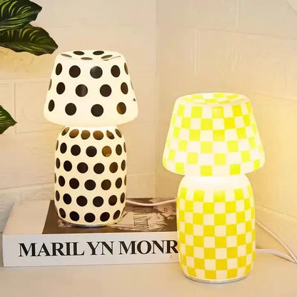 Cream-colored ceramic decorbites apollo mushroom glass table lamp with rounded mushroom-shaped base and matching shade