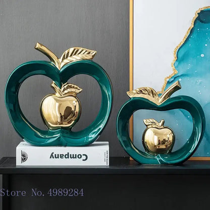 Teal ceramic decorbites apple hollow with polished gold interior and leaf accents candy jar for home decor
