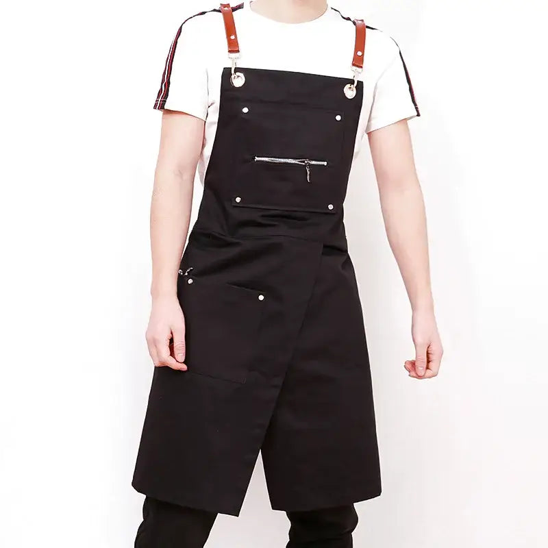 Black canvas decorbites apron with brown leather straps and silver hardware for personalized Korean fashion uniforms