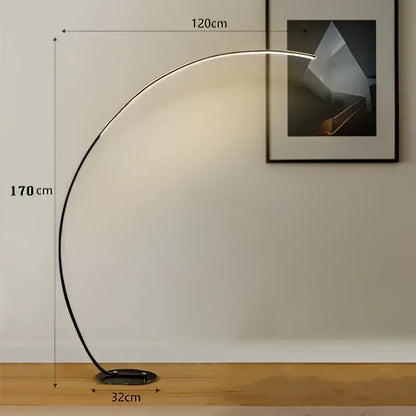 A sleek black metal decorbites arc floor lamp with an illuminated curved light for indoor dining and living room decor