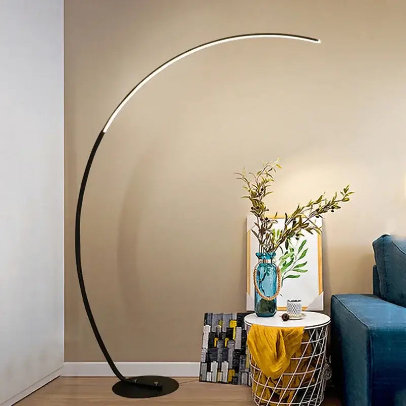 Modern black DecorBites arc shape floor lamp with sleek curved design and integrated LED lighting for living room decor