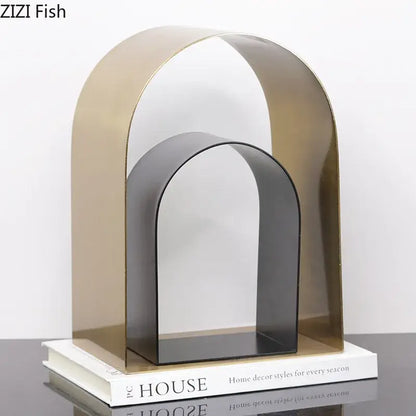 Modern metallic arch bookend with gold and black finish featuring clean lines and minimalist design for decorbites arches geometry desk decoration