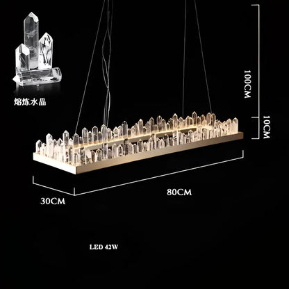 A modern decorbites arrow crystal led chandelier with clear prisms on a sleek rectangular base for living spaces