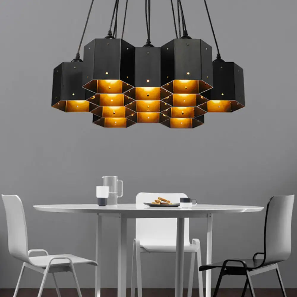 Art deco black metal hexagonal pendant ceiling light with gold interior panels for dining room by DecorBites