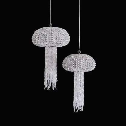Two silver crystal-encrusted jellyfish-shaped ornaments with chain tentacles in decorbites art deco dimmable chandelier lighting