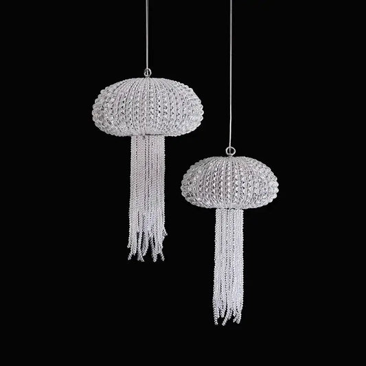Two silver crystal-encrusted jellyfish-shaped ornaments with chain tentacles in decorbites art deco dimmable chandelier lighting