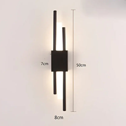 Black minimalist wall sconce with two vertical rods and central square base for decorbites art deco marble accent lighting