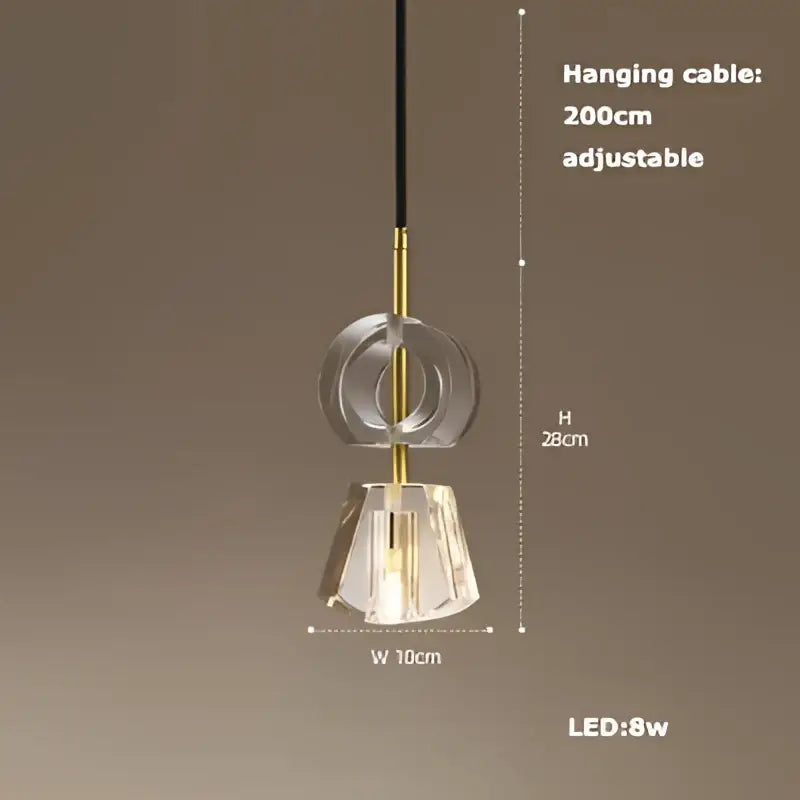 A modern DecorBites art deco pendant light with clear faceted crystal shade and gold-toned metal accents