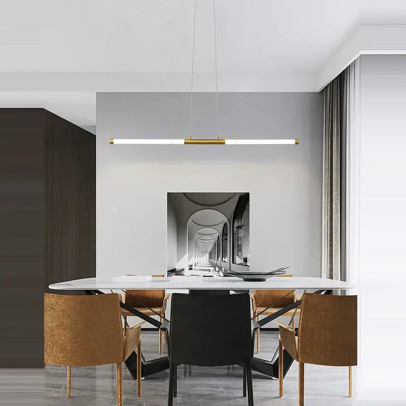 Gold-toned linear pendant light with sleek minimalist design for dining room by decorbites art deco led gold chandelier