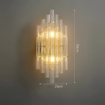 Gold-toned decorbites art deco wall sconce with clear glass tubes vertical cascading design for bedroom corridor lighting