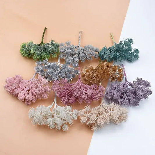 A collection of decorbites™ artificial gypsophila plants in pastel earthy tones crafted from textured plastic material