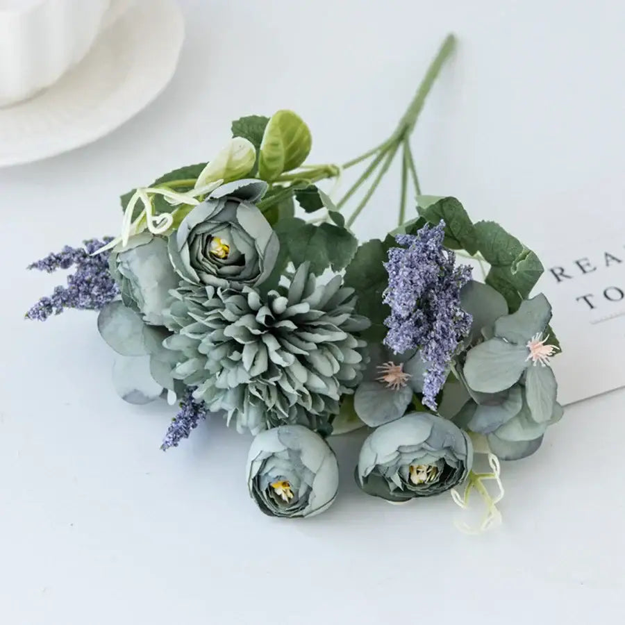 A delicate decorbites artificial hydrangea tea rose bouquet in soft sage green and lavender for home decor and weddings