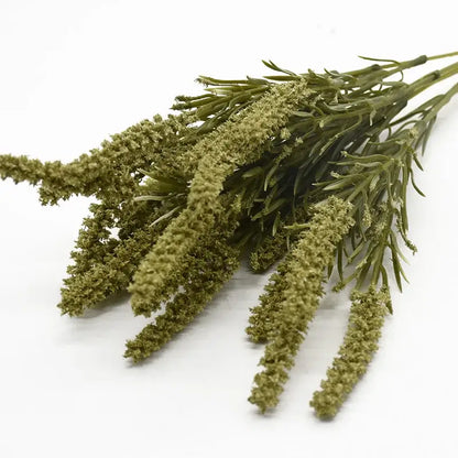 A bundle of artificial lavender plants with green grass-like stems and textured feathery tips for home decor