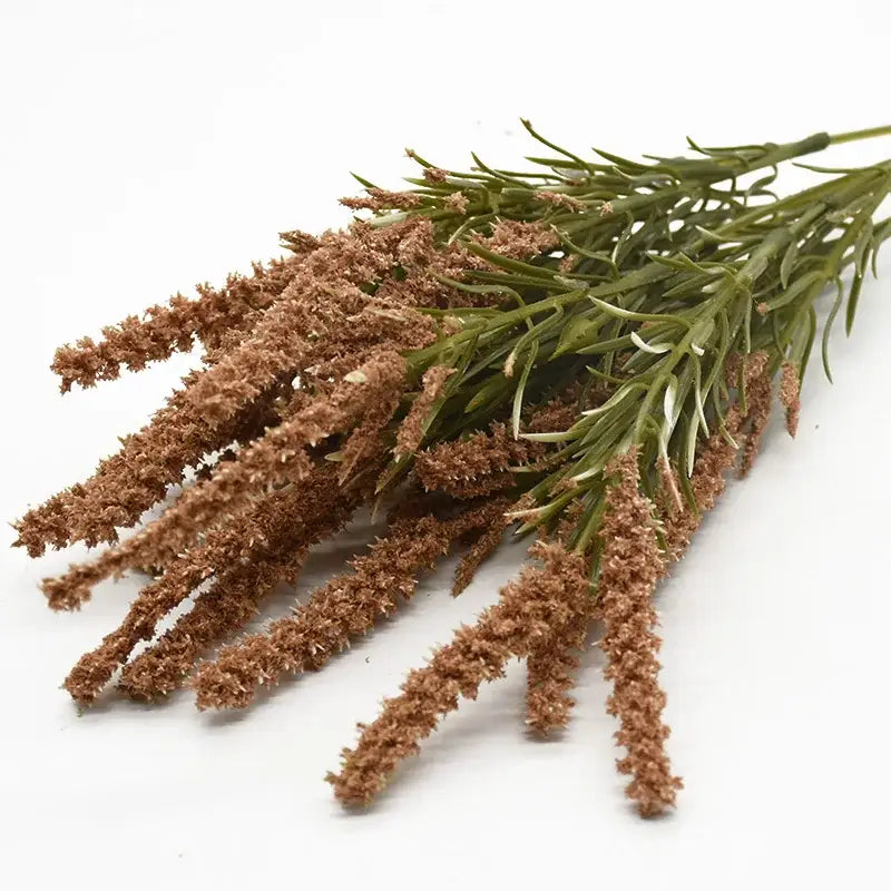 A bundle of artificial lavender plants with brown and green grass-like stems and textured feathery tips for home decor