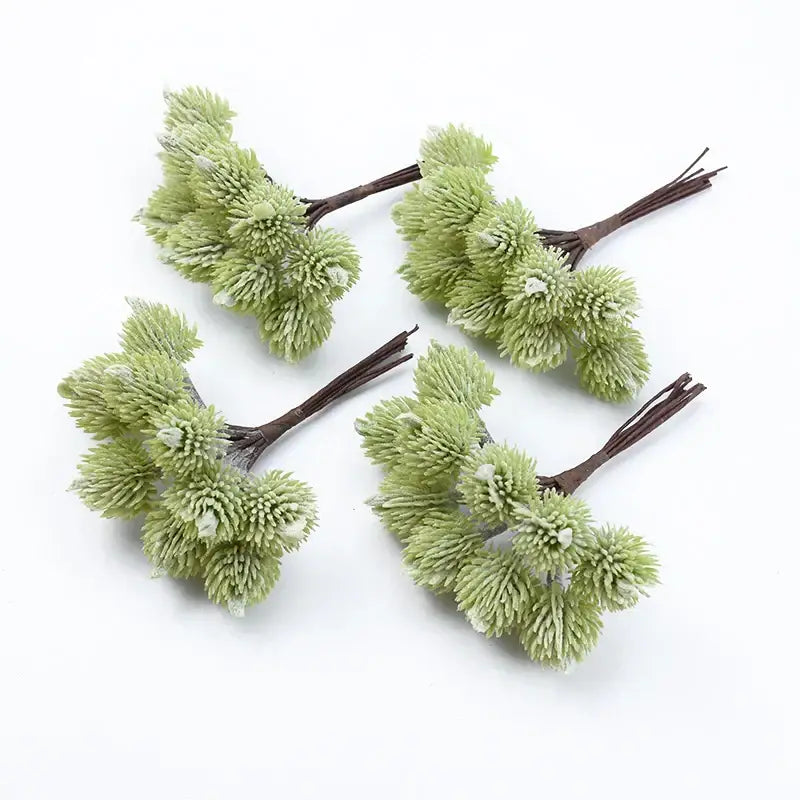 Light green fuzzy artificial spruce branches with brown stems from decorbites artificial plants christmas decorations
