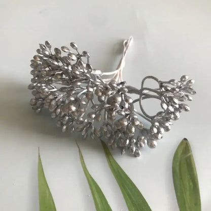 Silver metallic hair accessory shaped like a delicate branch with clustered berries and leaves from decorbites artificial plants dried plants collection for diy decor