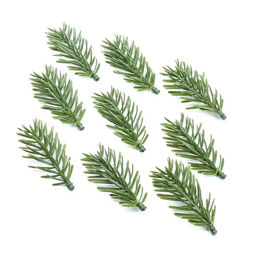 Green artificial pine sprigs from decorbites artificial plants made of plastic with realistic needle texture for decor use