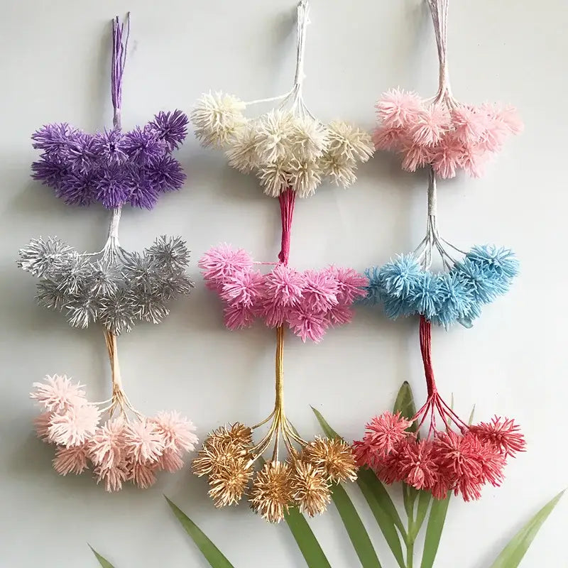 A set of 6 decorbites artificial plants featuring colorful fluffy pom-pom flower clusters for wedding and home decor