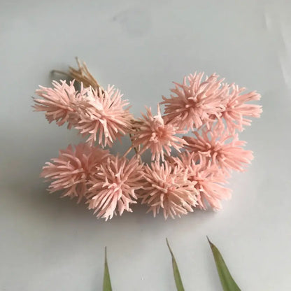 A cluster of delicate light pink dried artificial plants tied with natural twine from decorbites artificial plants set