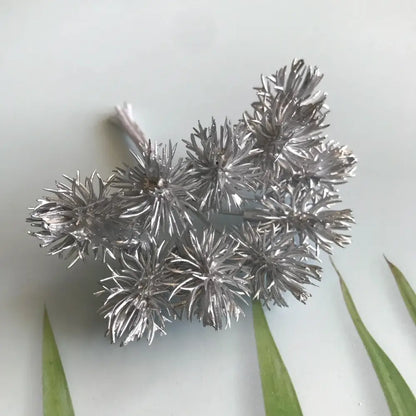 Silver metallic artificial flower cluster with spiky petals from decorbites artificial plants wedding and home decor set