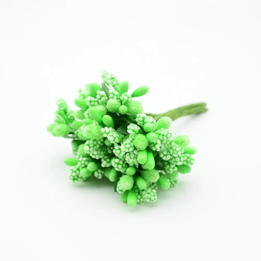 A vibrant lime green decorbites artificial stamen flower cluster with textured bead-like petals and a slender stem
