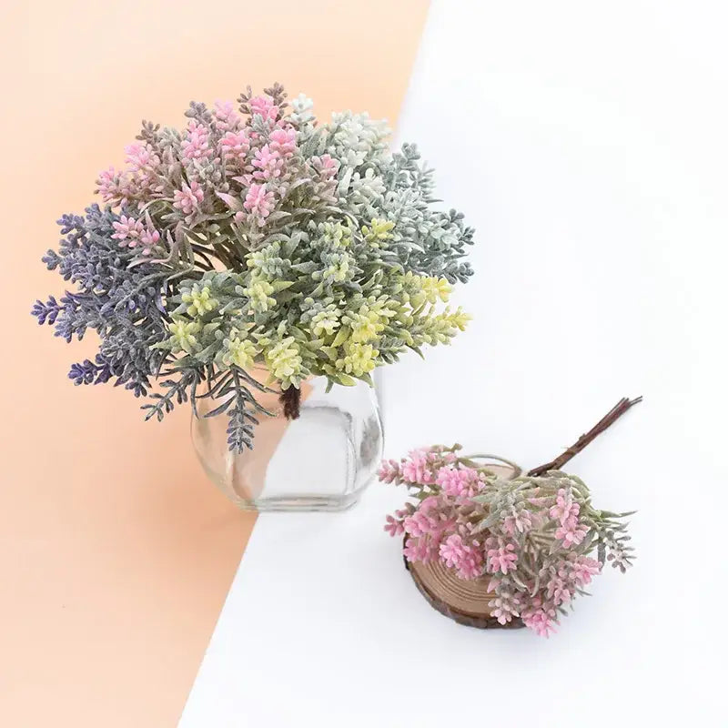 Decorbites artificial water grass vase featuring a colorful artificial succulent bouquet in pink purple green and yellow hues