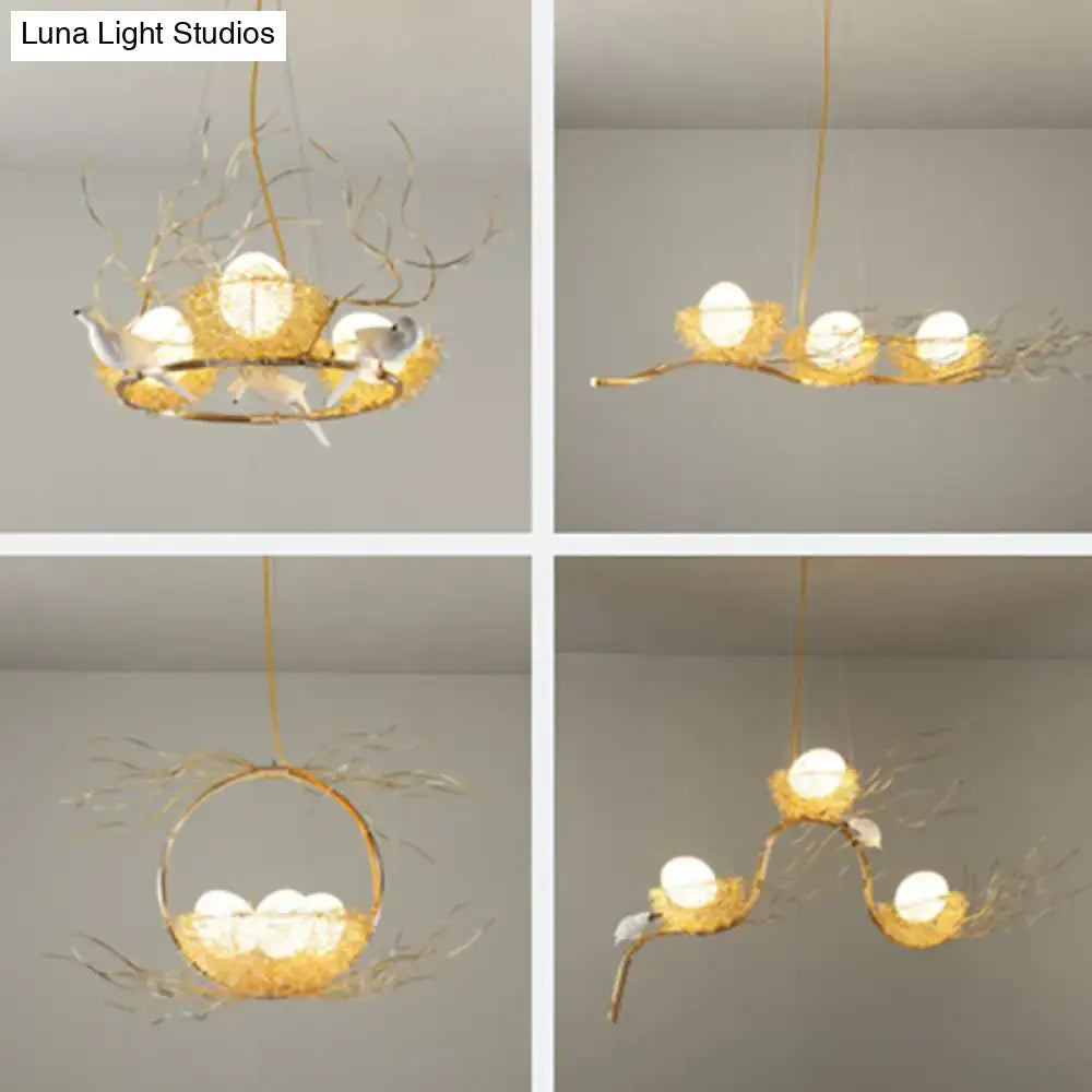 DecorBites Artistic 3-light beige nest and egg island pendant with golden bird’s nest, ceramic eggs, sculpted birds, 220v-240v art deco branch bird design