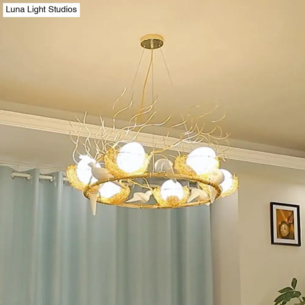 Gold-toned decorbites 3-light beige nest and egg island pendant with art deco branch bird arms and cream glass shade 110v-120v