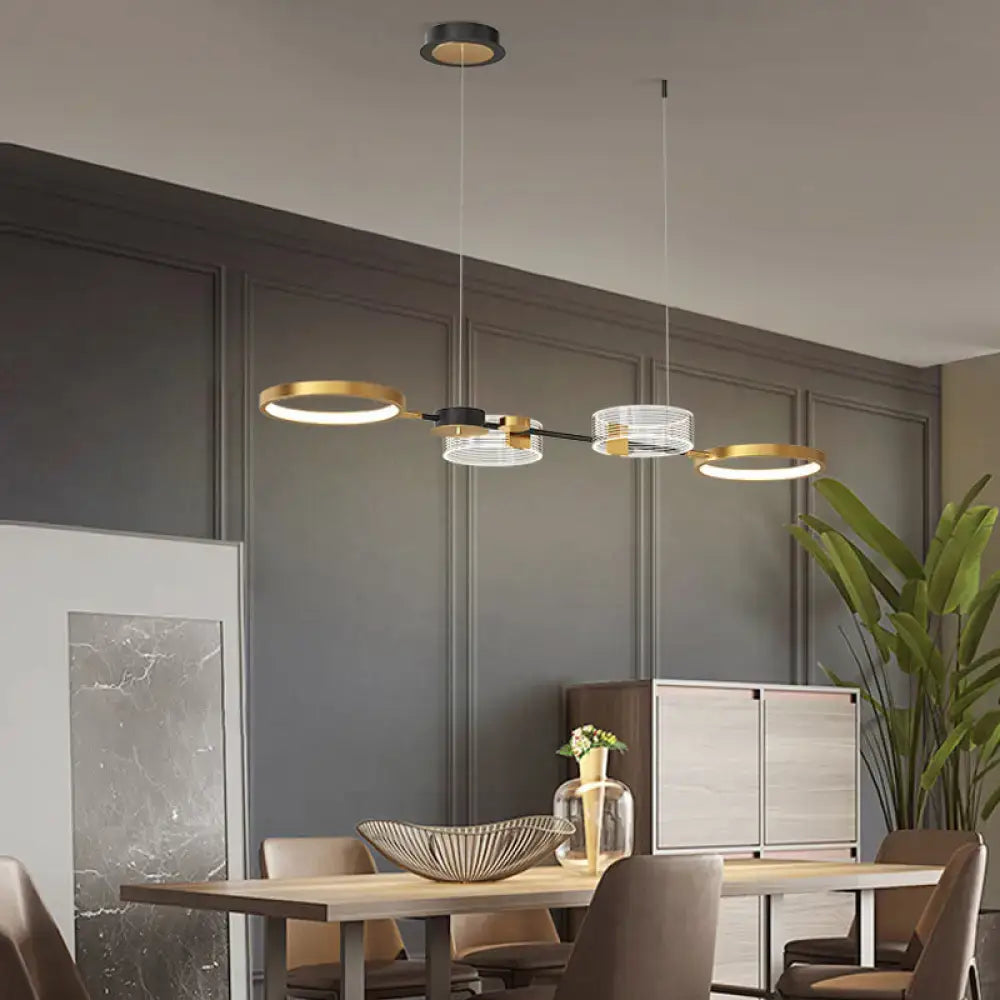 DecorBites™ artistic metal LED ceiling pendant light with gold ring island design and black accents for dining room