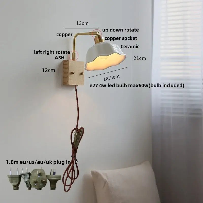 Decorbites ash wood wall light with copper arm and off-white ceramic shade emitting warm light modern nordic design