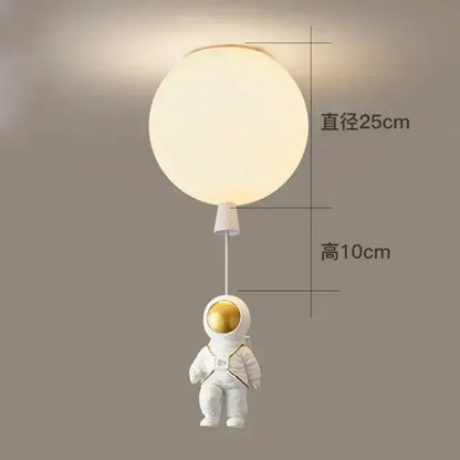 Decorbites astronaut balloon ceiling lamp featuring a white astronaut figurine with gold visor and frosted glass globe light