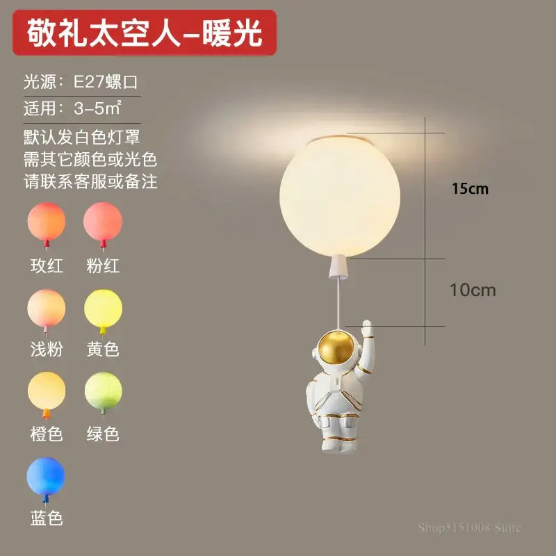 White decorbites astronaut balloon pendant light with gold accents and spherical led fixture for nursery room