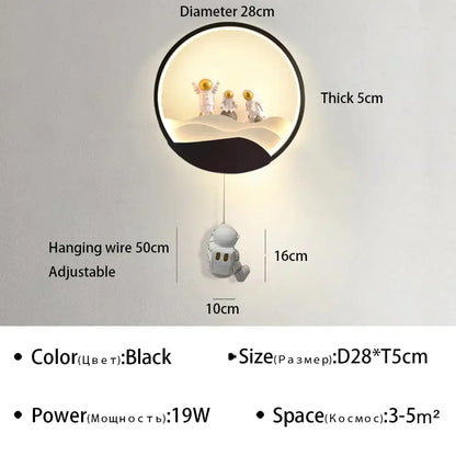 Black circular decorbites astronaut cartoon led wall lamp with three figurines inside illuminated dome and hanging astronaut