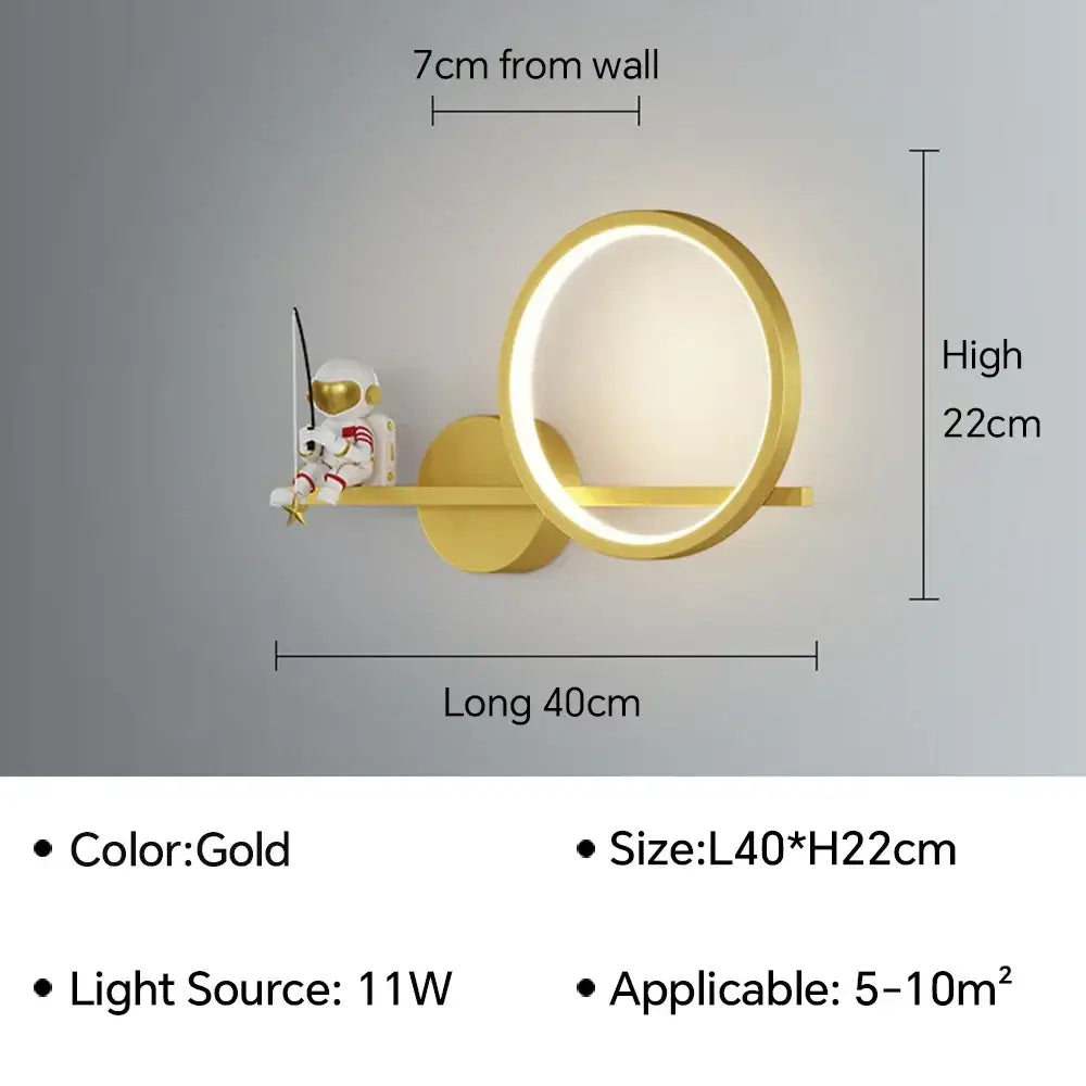 Gold circular LED wall lamp with miniature astronaut cartoon figurine by DecorBites for modern home decor