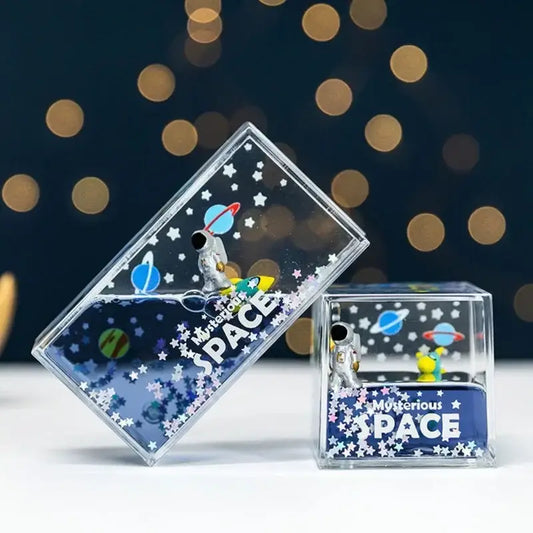 Clear rectangular resin keepsake boxes with miniature astronauts planets and stars in liquid interior for decorbites astronaut drift keychain