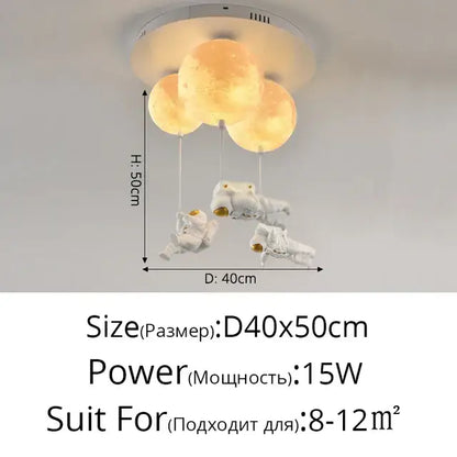 A decorbites astronaut globe ceiling light featuring three glowing moon orbs suspended above white astronaut figures