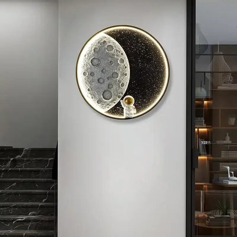 Decorbites™ astronaut led wall lamp with silver cratered moon and white astronaut figurine on black starry resin background