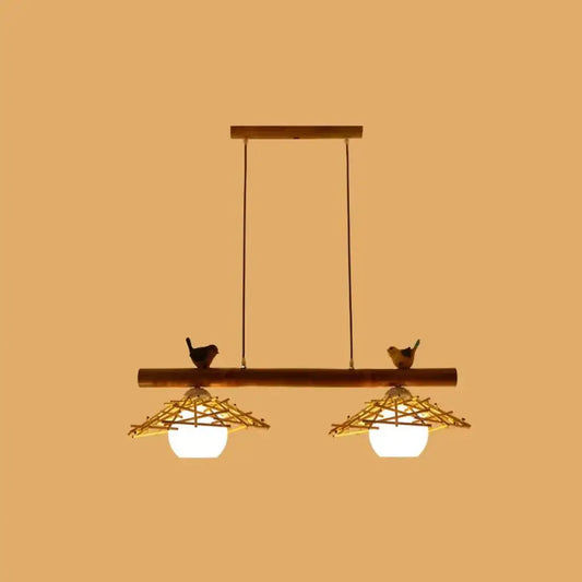 Rustic wooden bamboo pendant lighting with white glass shades and bird figurines in art deco style
