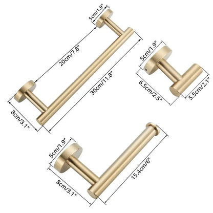 Gold-toned metal toilet paper holders with sleek minimalist design in the decorbites™ bathroom hardware set