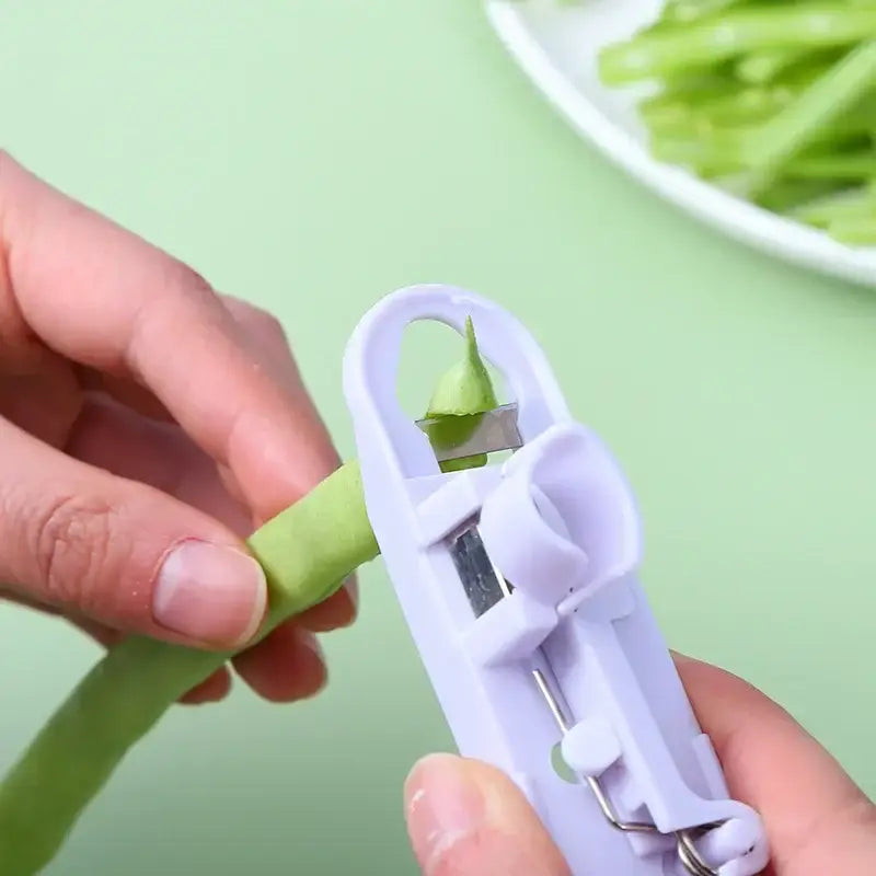 White plastic bean slicer cutter with metal blade decorbites bean slicer for peeling and stringing vegetables and fruits
