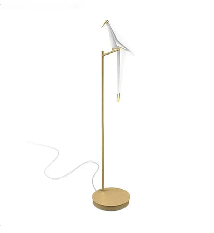 Gold-toned decorbites bird origami floor lamp with white origami crane perched on slender pole for living room lighting