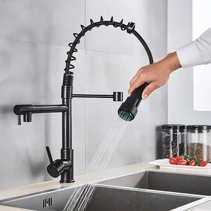 Decorbites black brass kitchen faucet with dual spout and flexible coiled gooseneck pull down spray in black matte finish